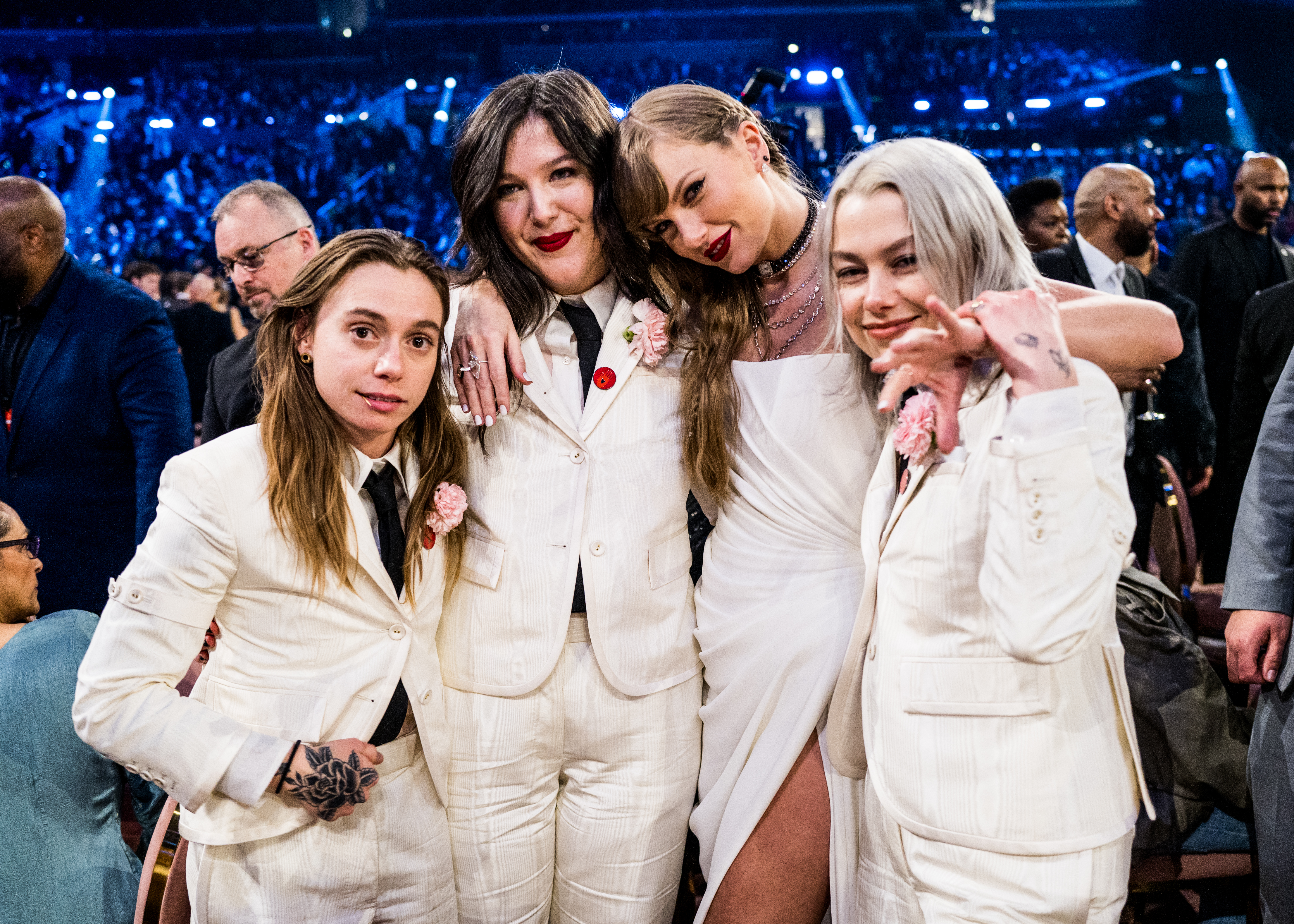 Taylor Swift with Julien Baker and Lucy Dacus and Phoebe Bridgers from boygenius seem to hit it off very well.  They look like a K-Pop group all dressed to match.