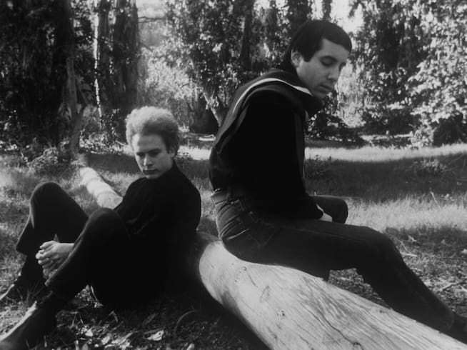 Another photo of Paul Simon and singer in the 1966 spot