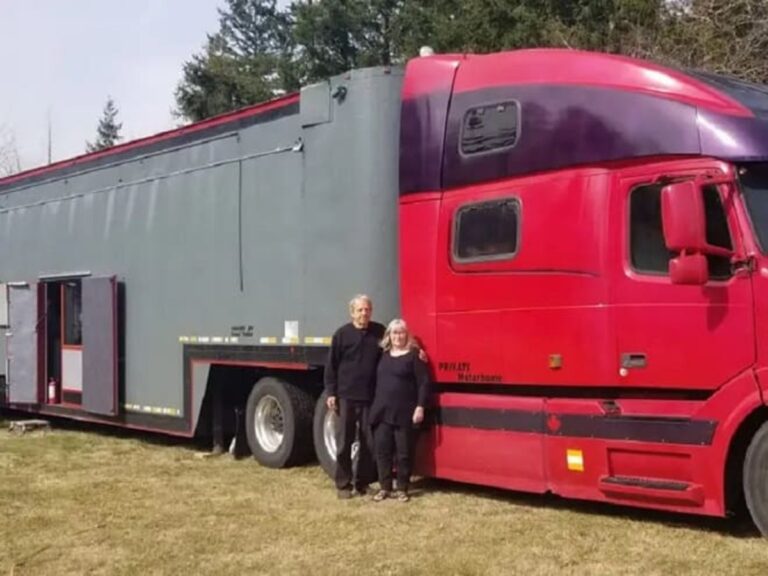 couples behind teh truck