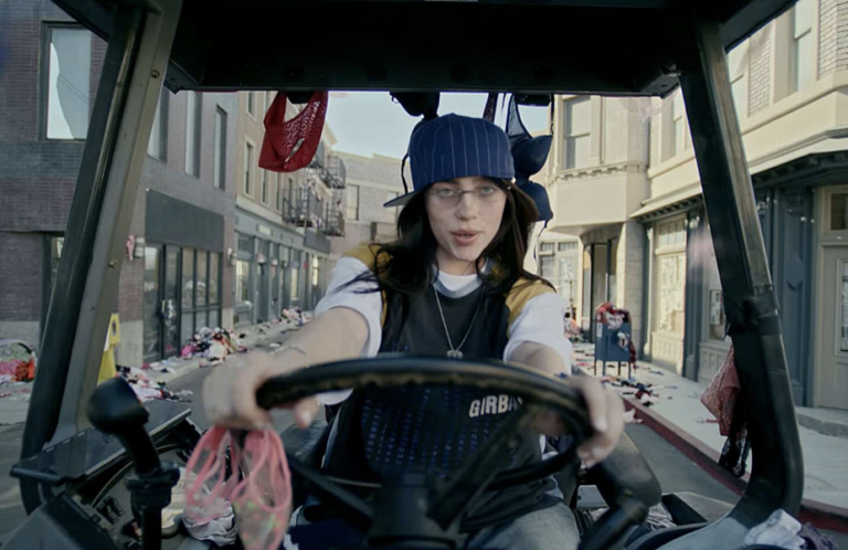 Billie Eilish in a rain of panties in the music video "Guess" with Charli XCX